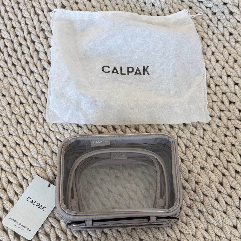 Calpak Small Clear Cosmetics Case in color Stone